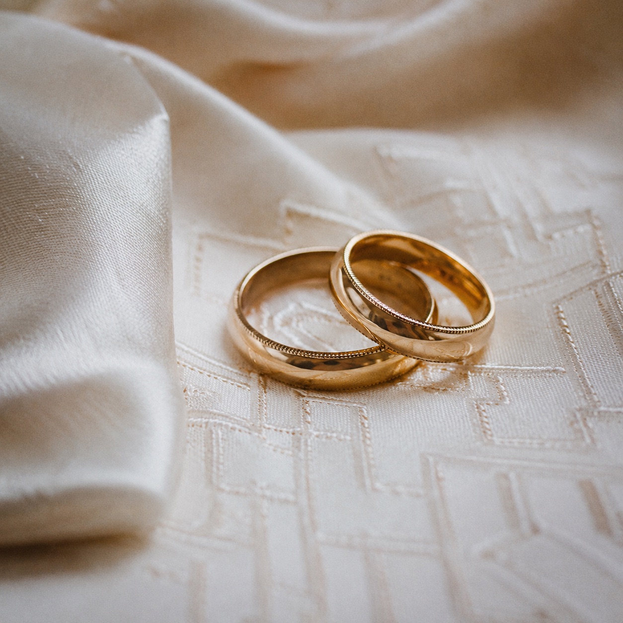Amira and Bilal smiling together, an editorial wedding portrait